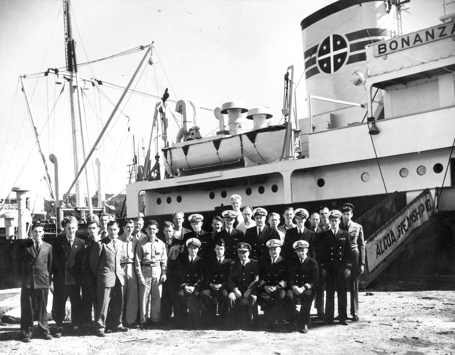 N THE WAKE OF THE WAR: Harry Olsen was a crew member aboard the Bonanza, returning from Europe with troops and cargo when they stopped at Bermuda and had this picture taken. Can you pick out Harry? He can, of course.
